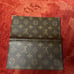 Authentic Louis Vuitton Monogram Bi-fold Wallet.