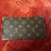 Authentic Louis Vuitton Monogram Bi-fold Wallet.