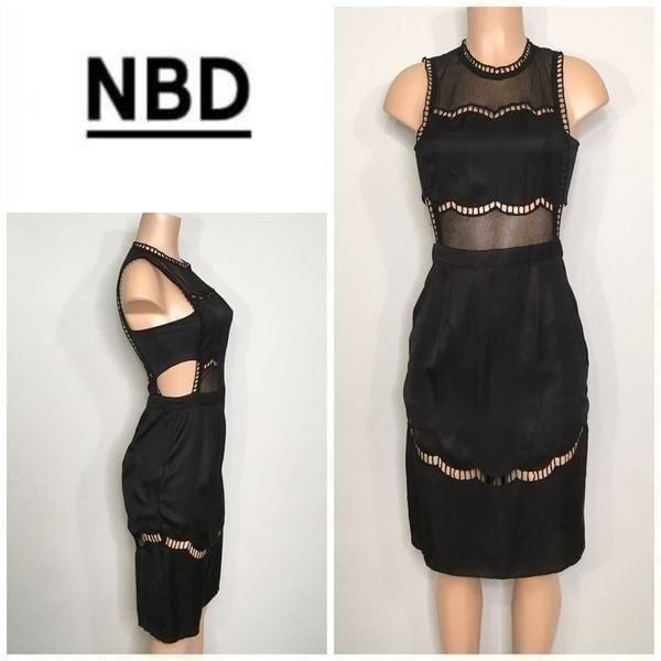 New. NBD black cut out lace trimmed dress.