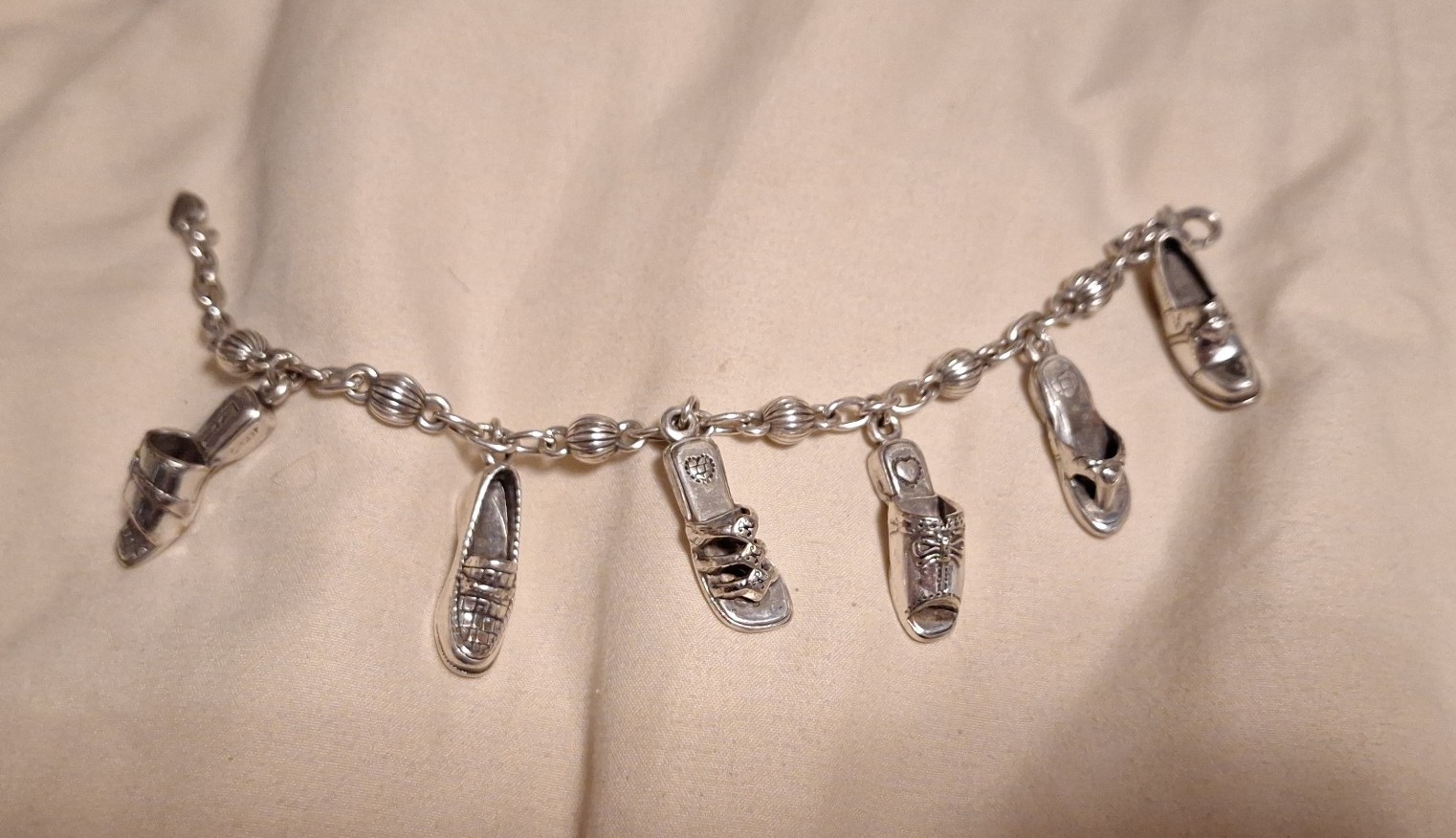 Brighton silver charm bracelet flop shoes