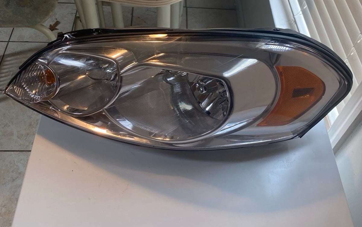 2006 CHEVY IMPALA LEFT (DRIVER SIDE) HEADLIGHT