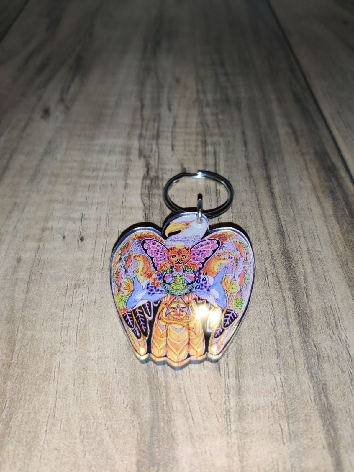 Sue Coccia Earth International Eagle Graphic Keychain. Has some wear from age an Sue Coccia Earth International Eagle Graphic Keychain. Has some wear from age an