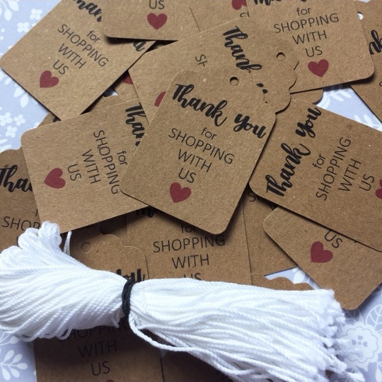 (1,000) pieces of kraft Thank You For Shopping w/ Us ♥️ tags + strings included
