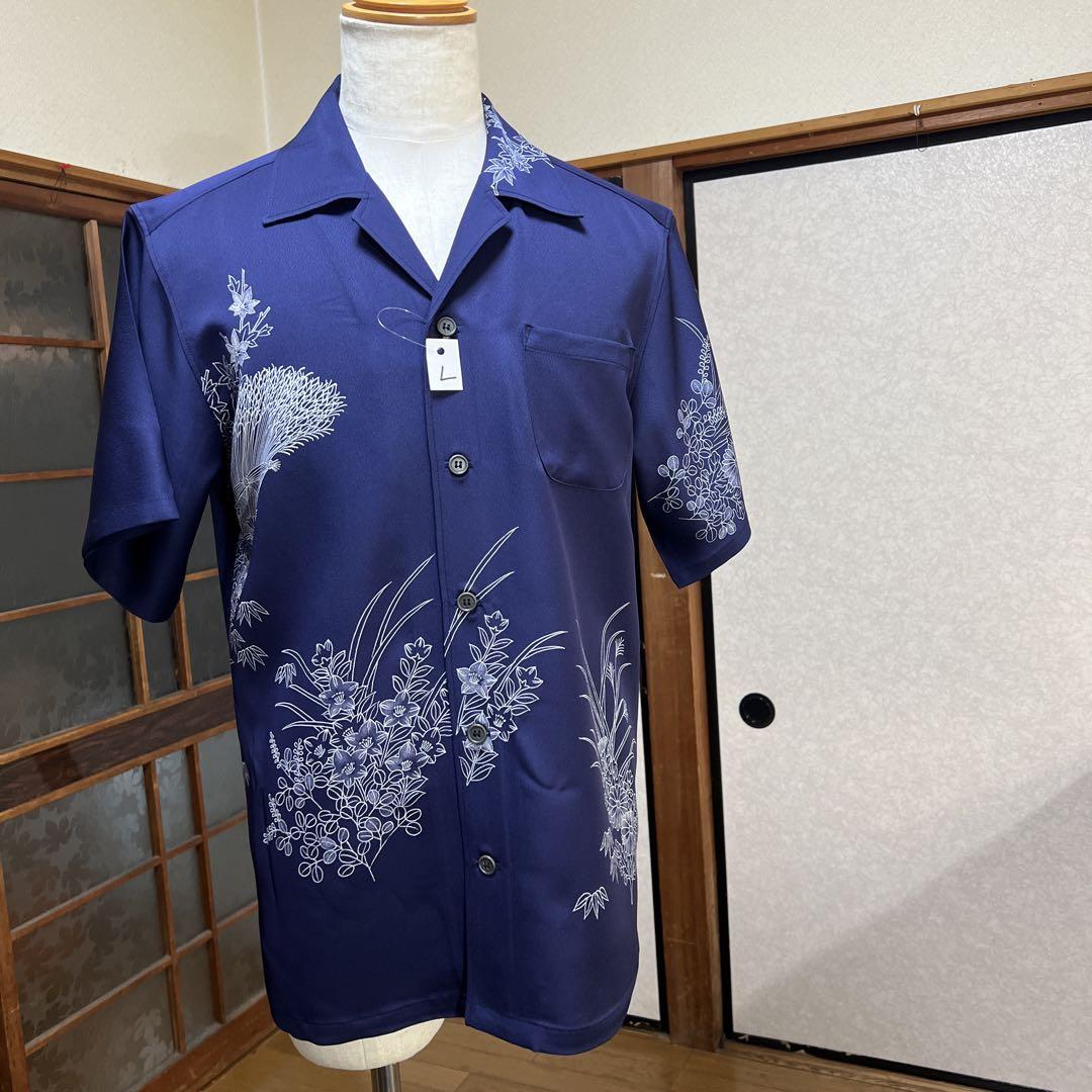 Aloha shirt, size L, navy blue with floral embroidery.