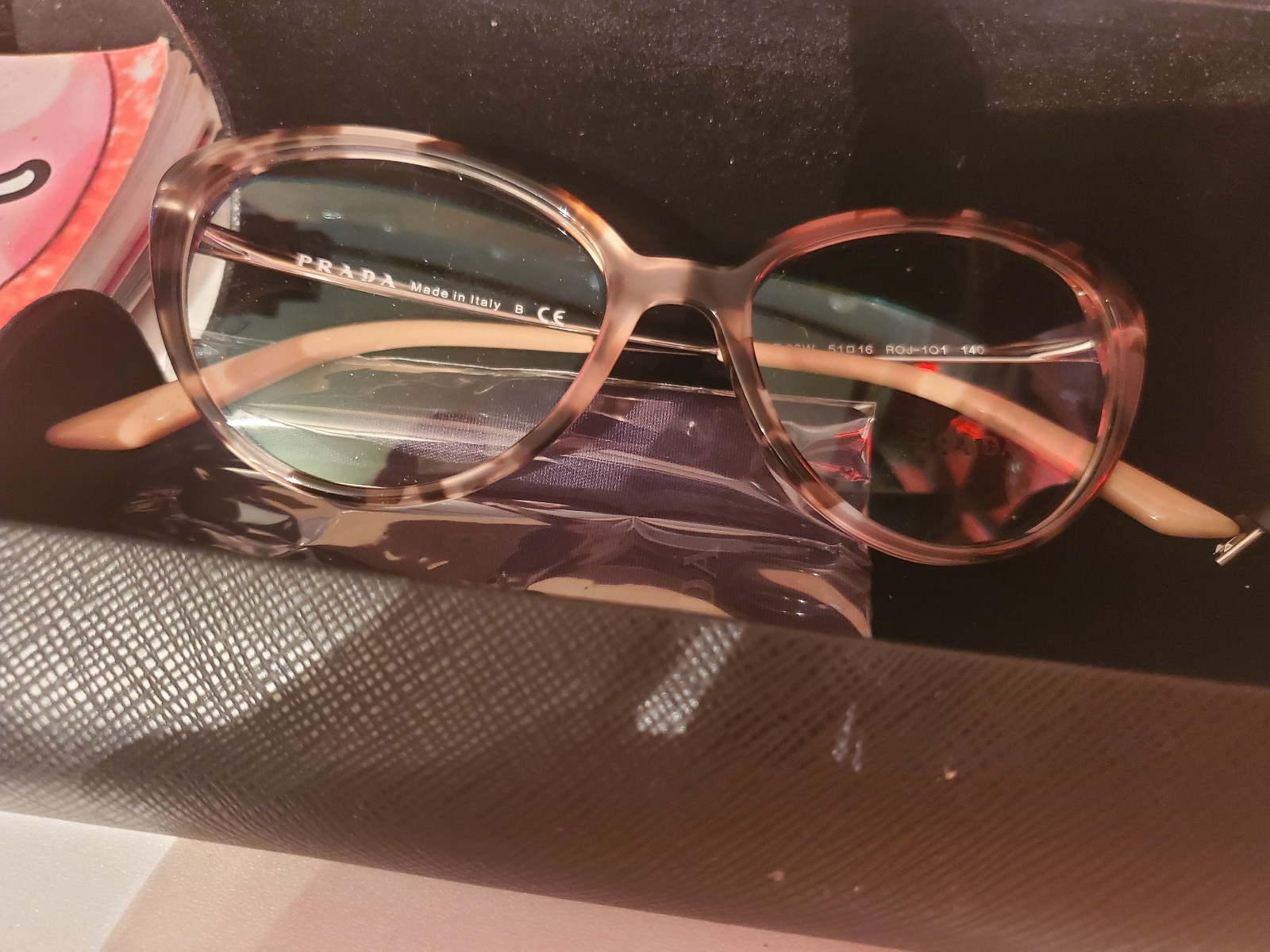 Prada pink glasses for women
