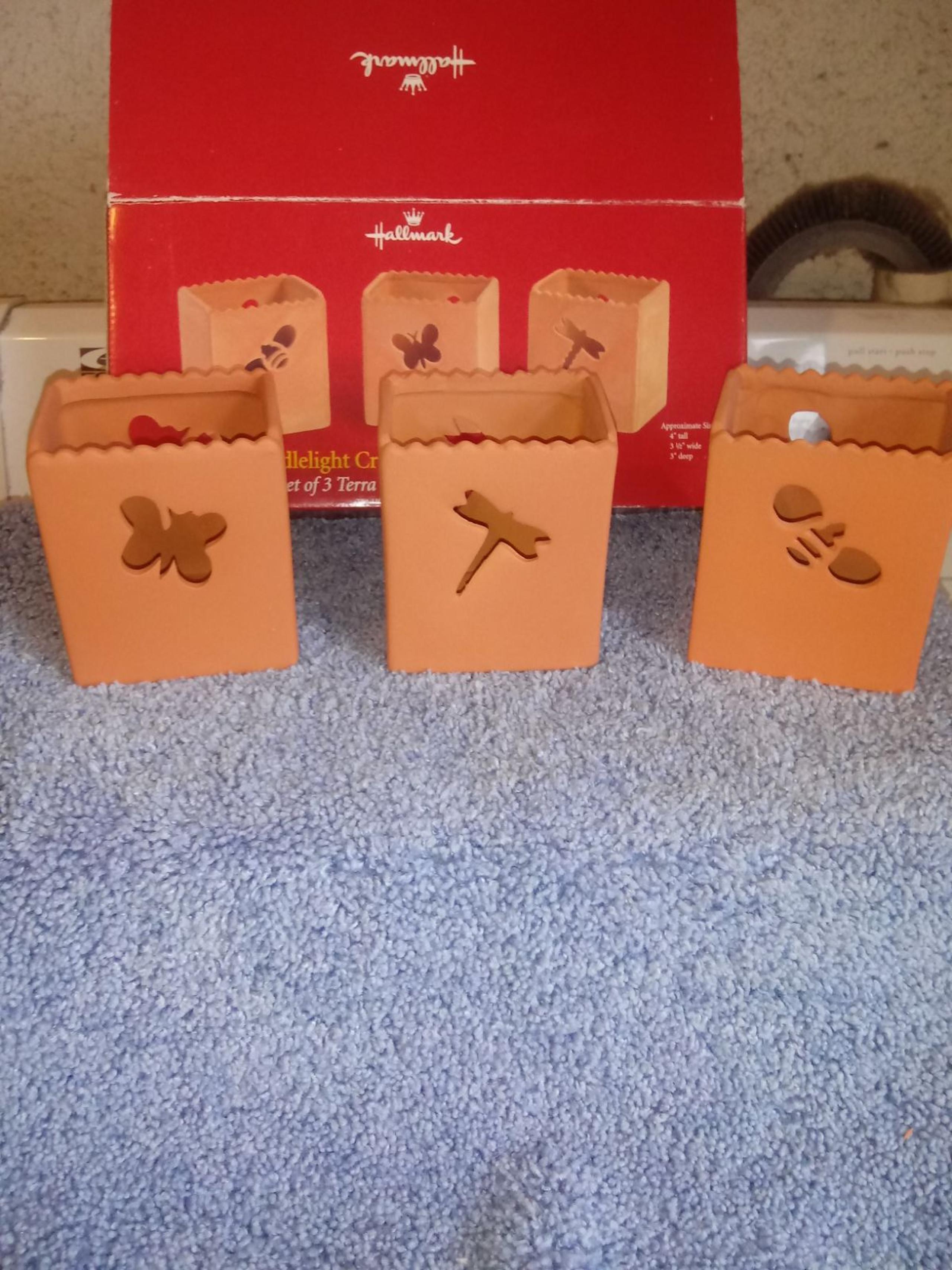 Hallmark terracotta candle holders