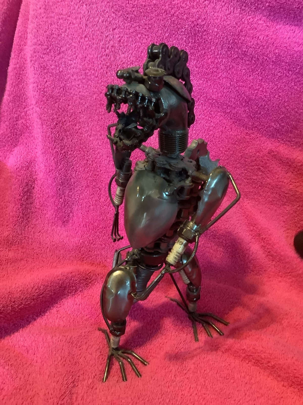 Metal trex statue