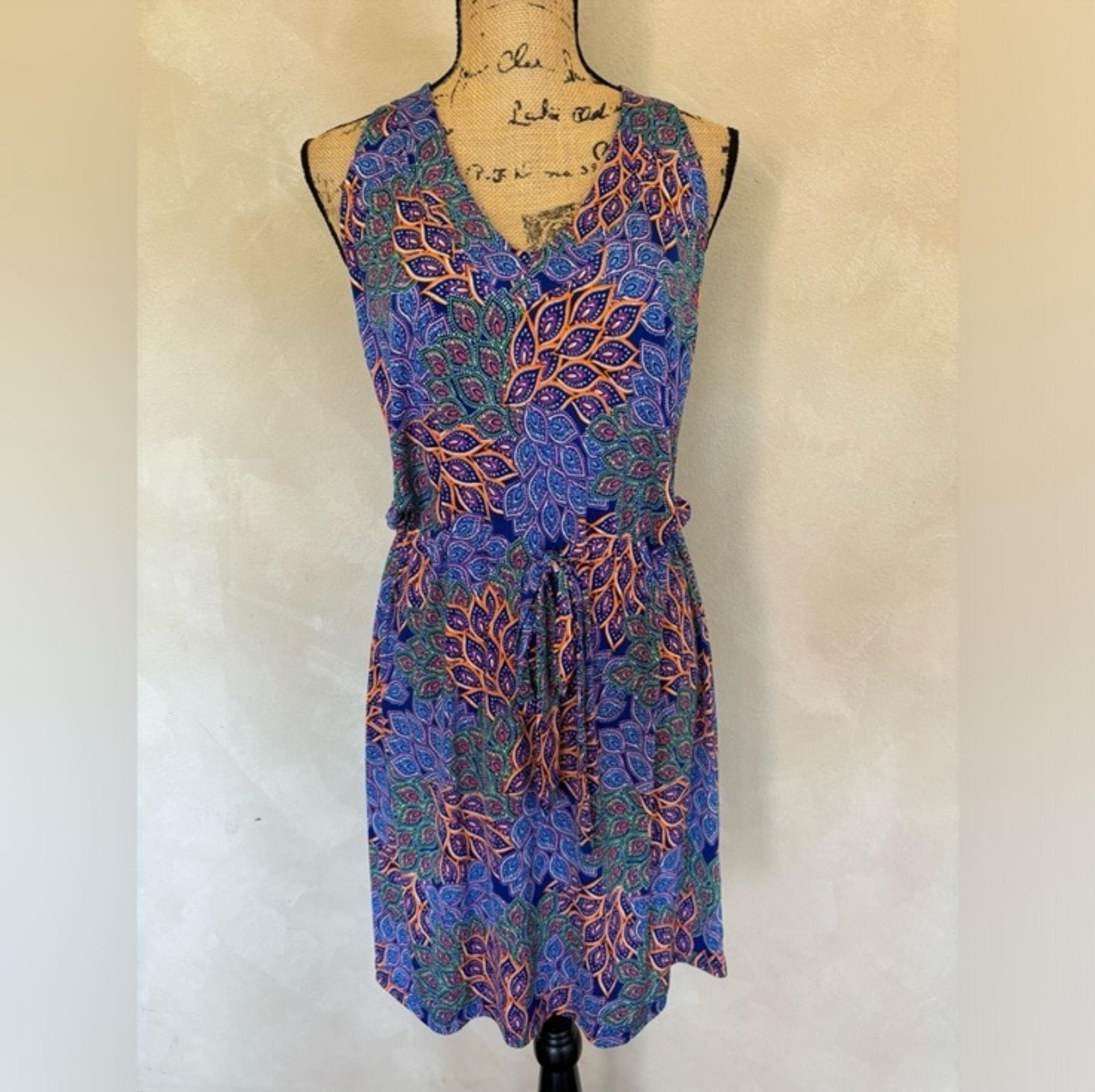Veronica M dress with a colorful peacock print and racer back design