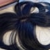 Black topoer. Human hair