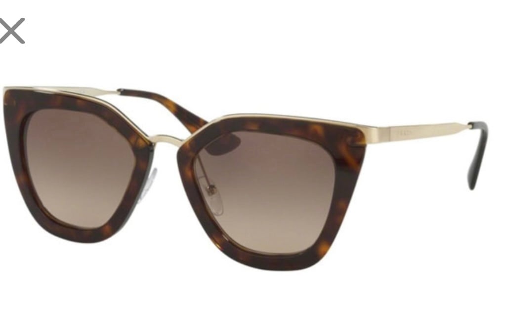 Authentic Prada PR 53SS CATWALK Sunglasses minimally used. Some minor scratches.