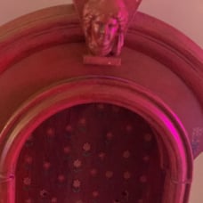 Antique clock holder.