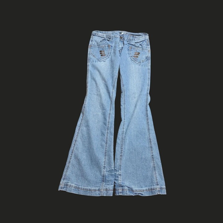 flared vintage 2000s jeans, button front details with chunky belt loops, embelli