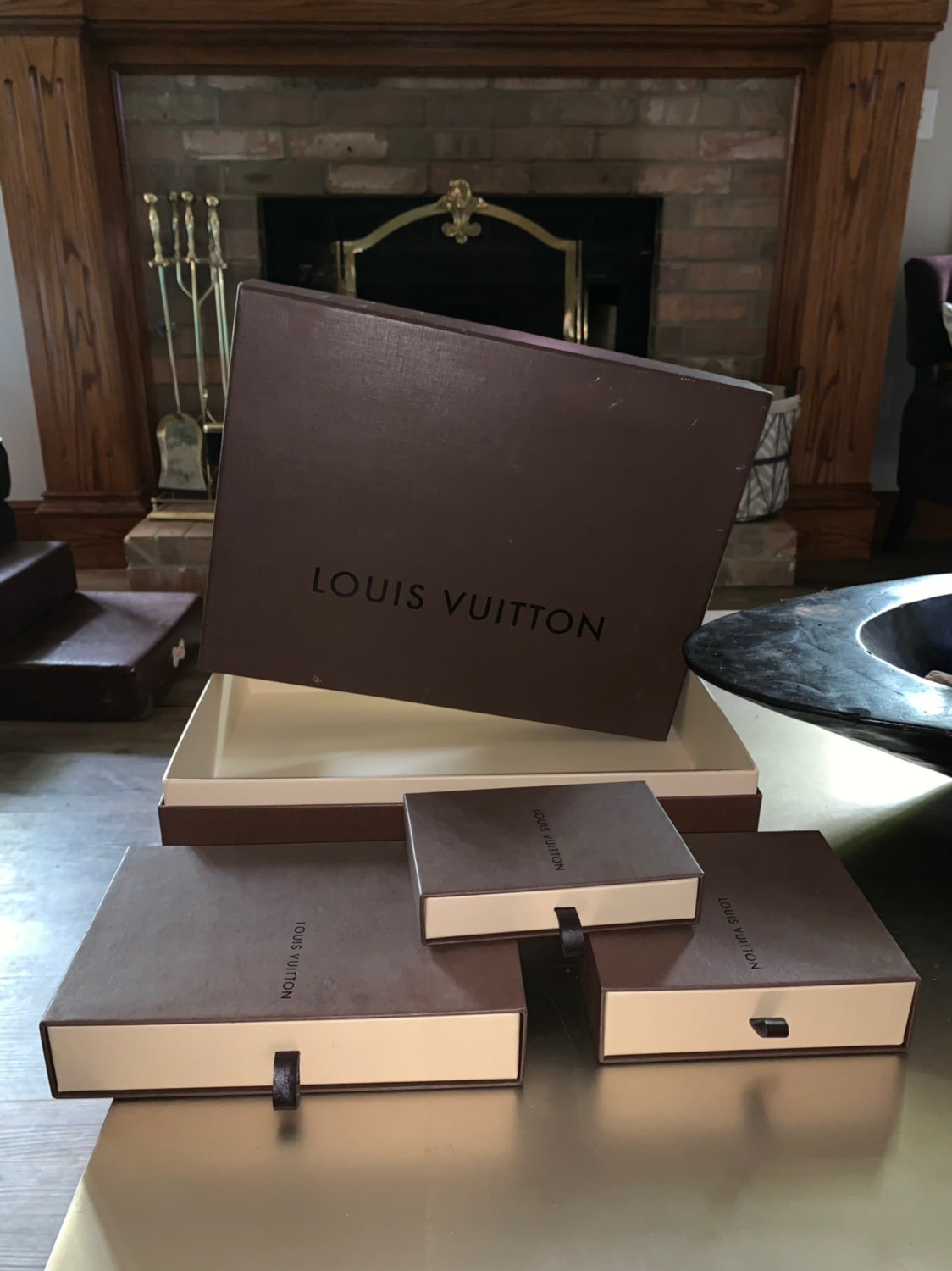 A Set Of 4 Louis Vuitton Boxes