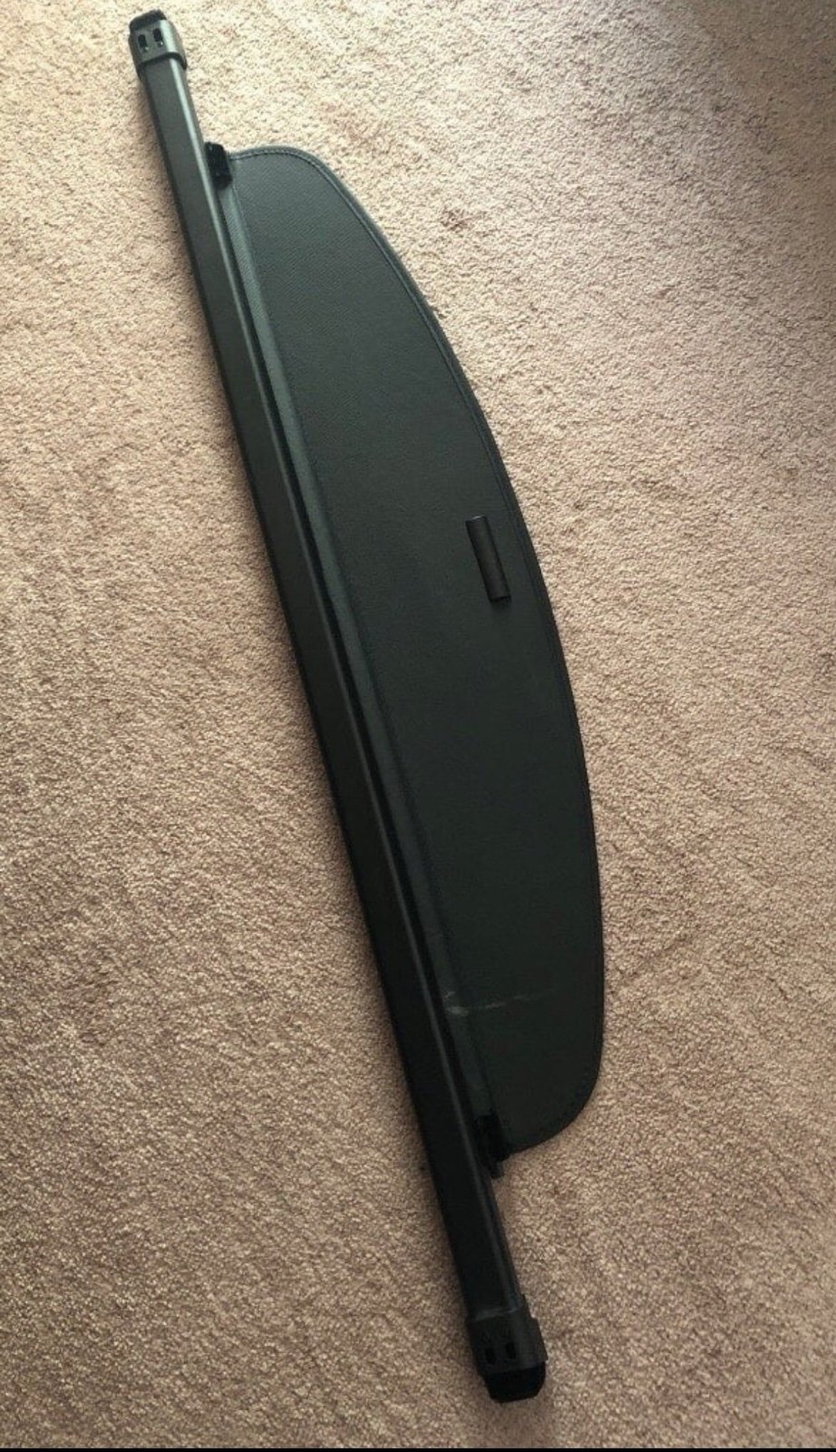 Retractable black cargo cover for Mazda