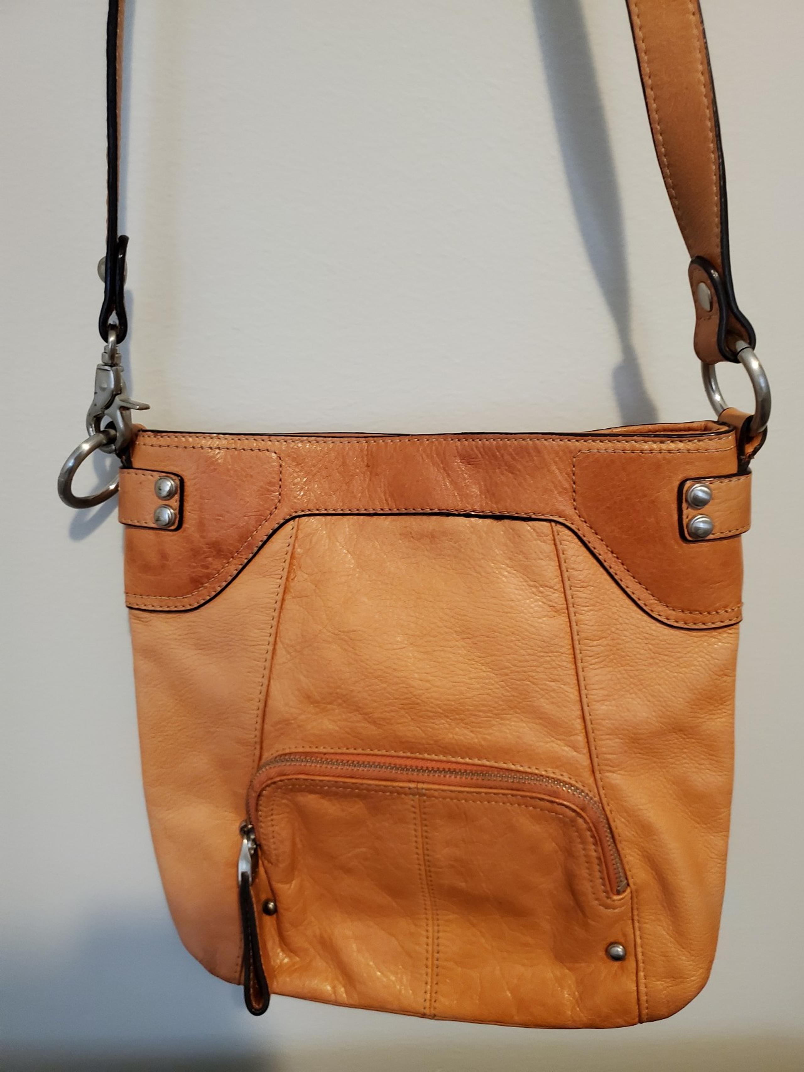B. Makowsky orange leather crossbody bag