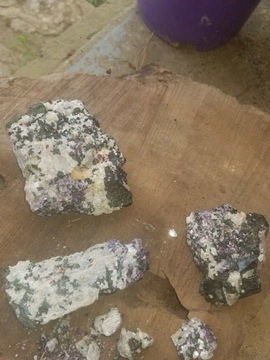 lot of raw black tourmaline with amethyst and topaz