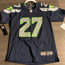 Tariq Woolen unused authentic with tags Jersey. Size youth medium #27 Seahawks.