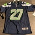Tariq Woolen unused authentic with tags Jersey. Size youth medium #27 Seahawks.