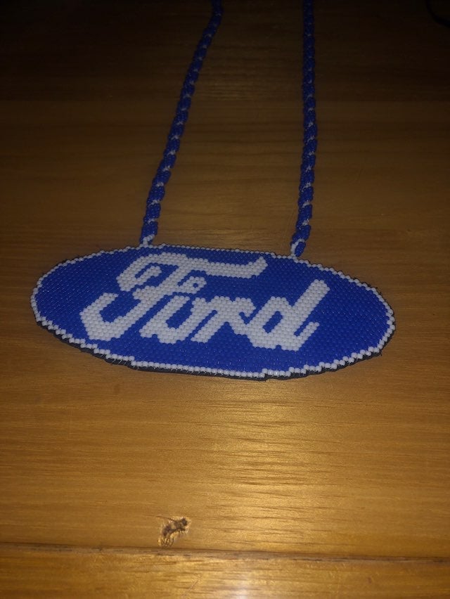 2 beaded ford pendents and necklesses