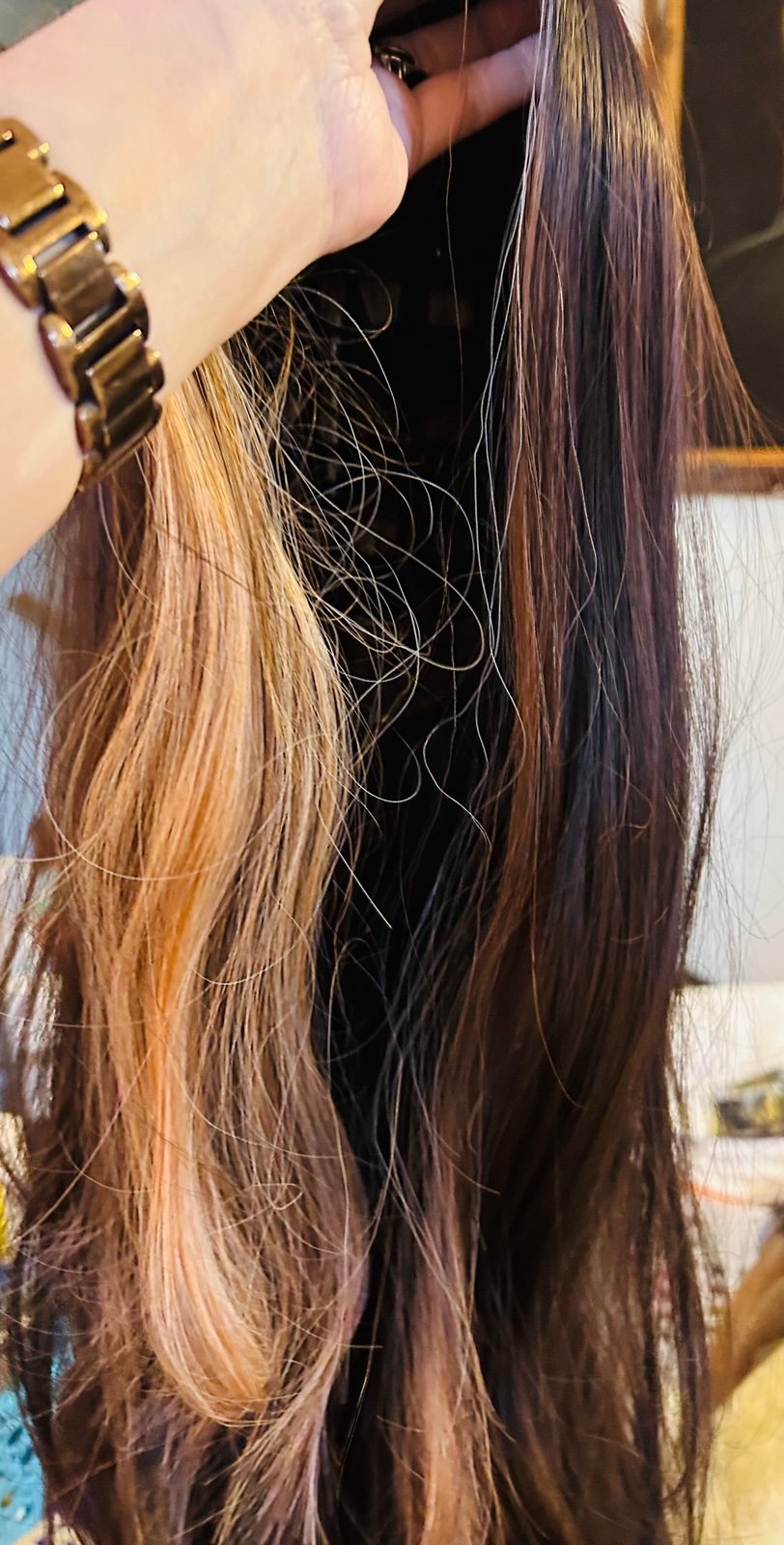 Wig dark brown with lightish blondish brown, right in the very front the wig