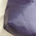 purple nylon and leather tote bag