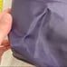 purple nylon and leather tote bag