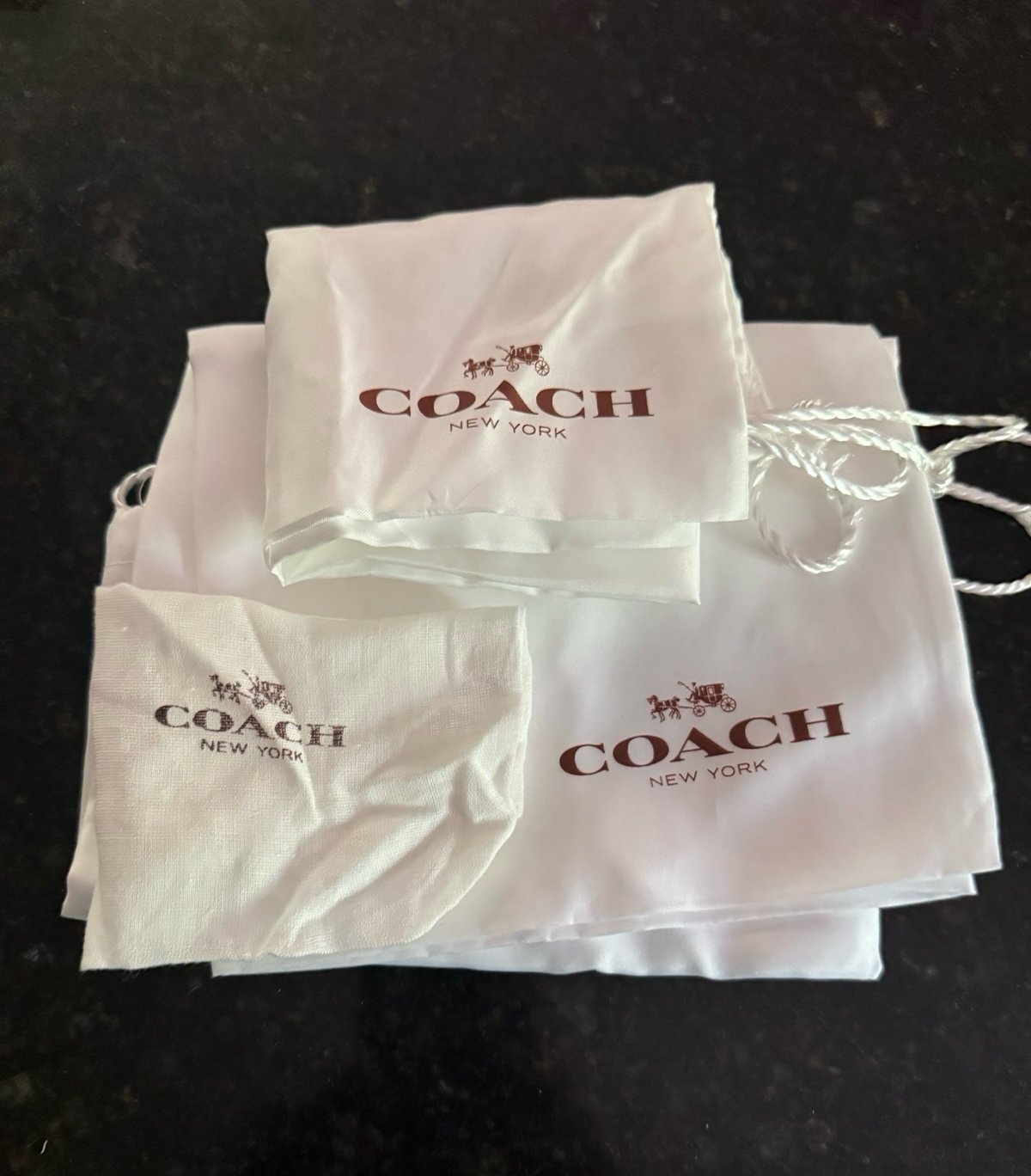 Coach dust bags , set of 3 white with brown logo, XL and L size EUC