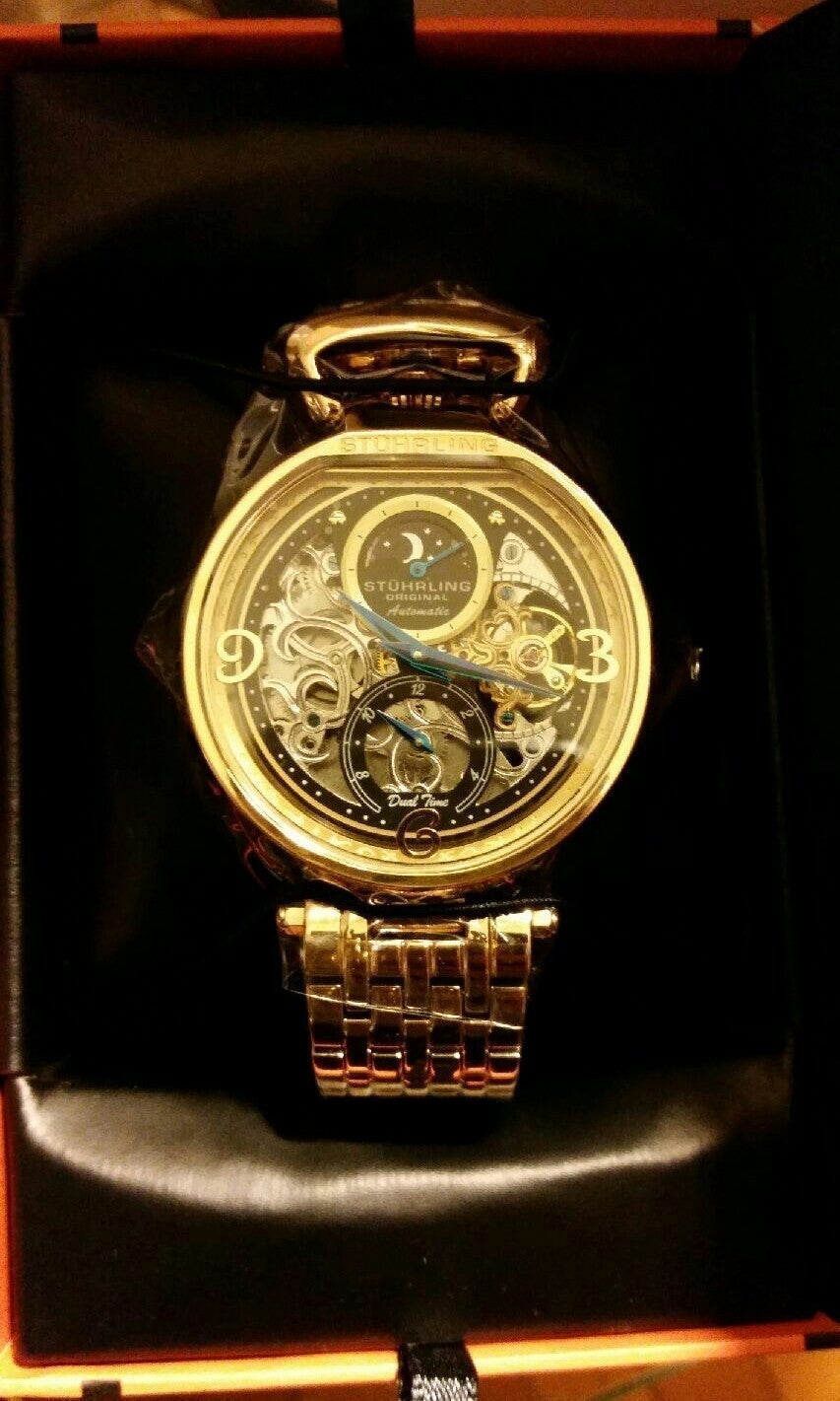 New men's stührling modena skeleton wtch