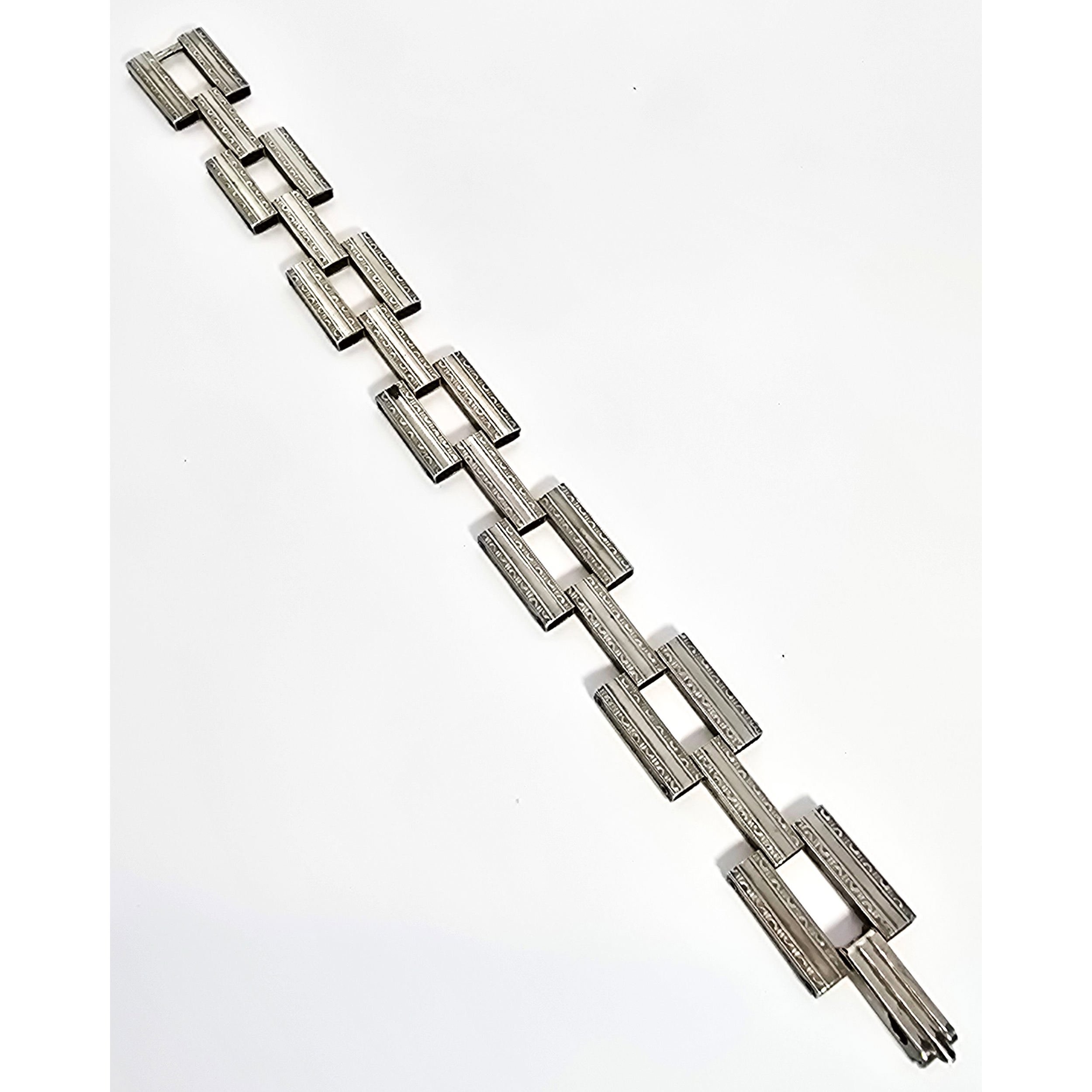 Art Deco embossed flower articulated chain link antique sterling silver bracelet