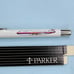 Two PARKER ballpoint pens
