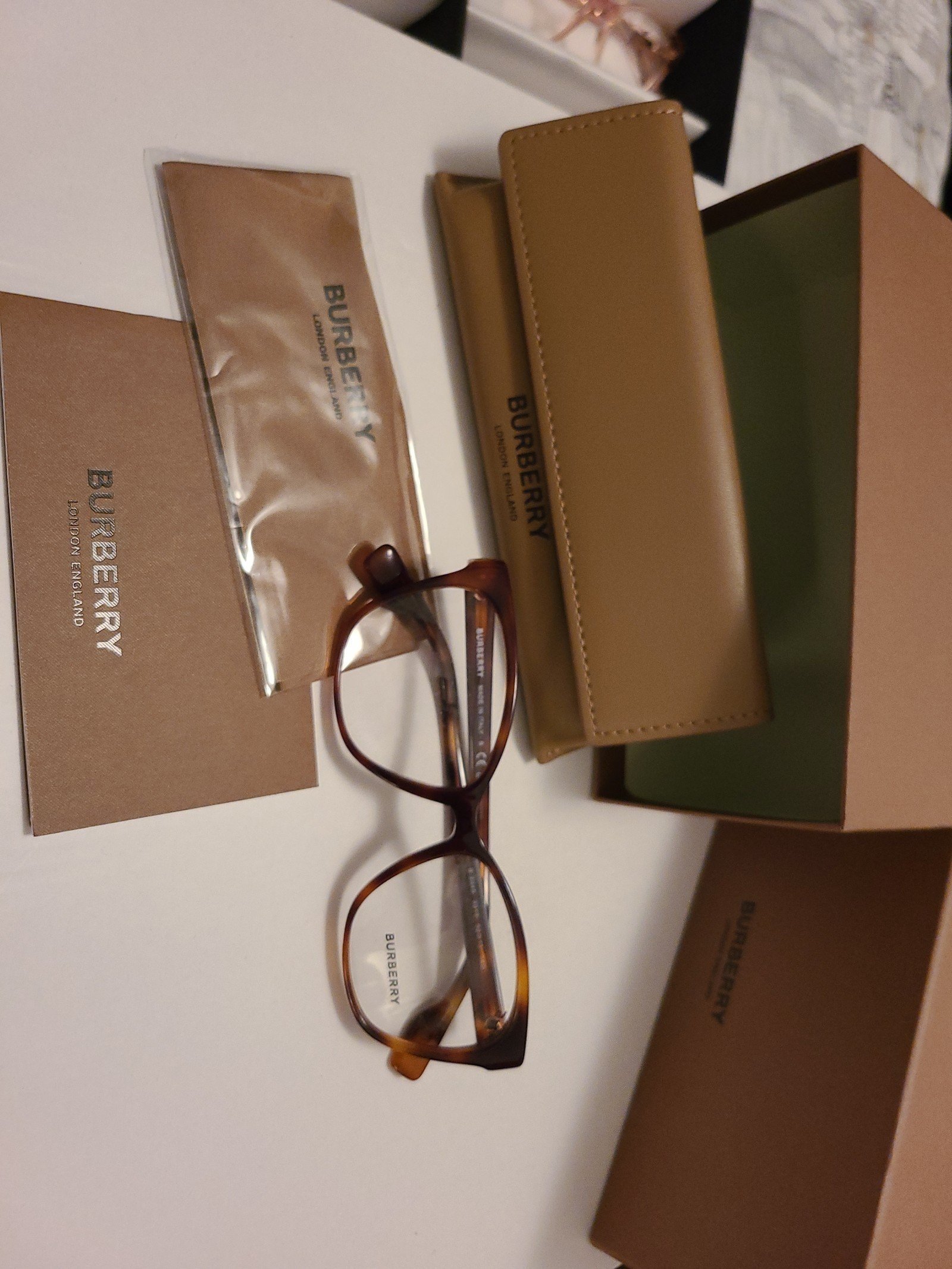 Burberry brown tort new w/matching case cloth and box