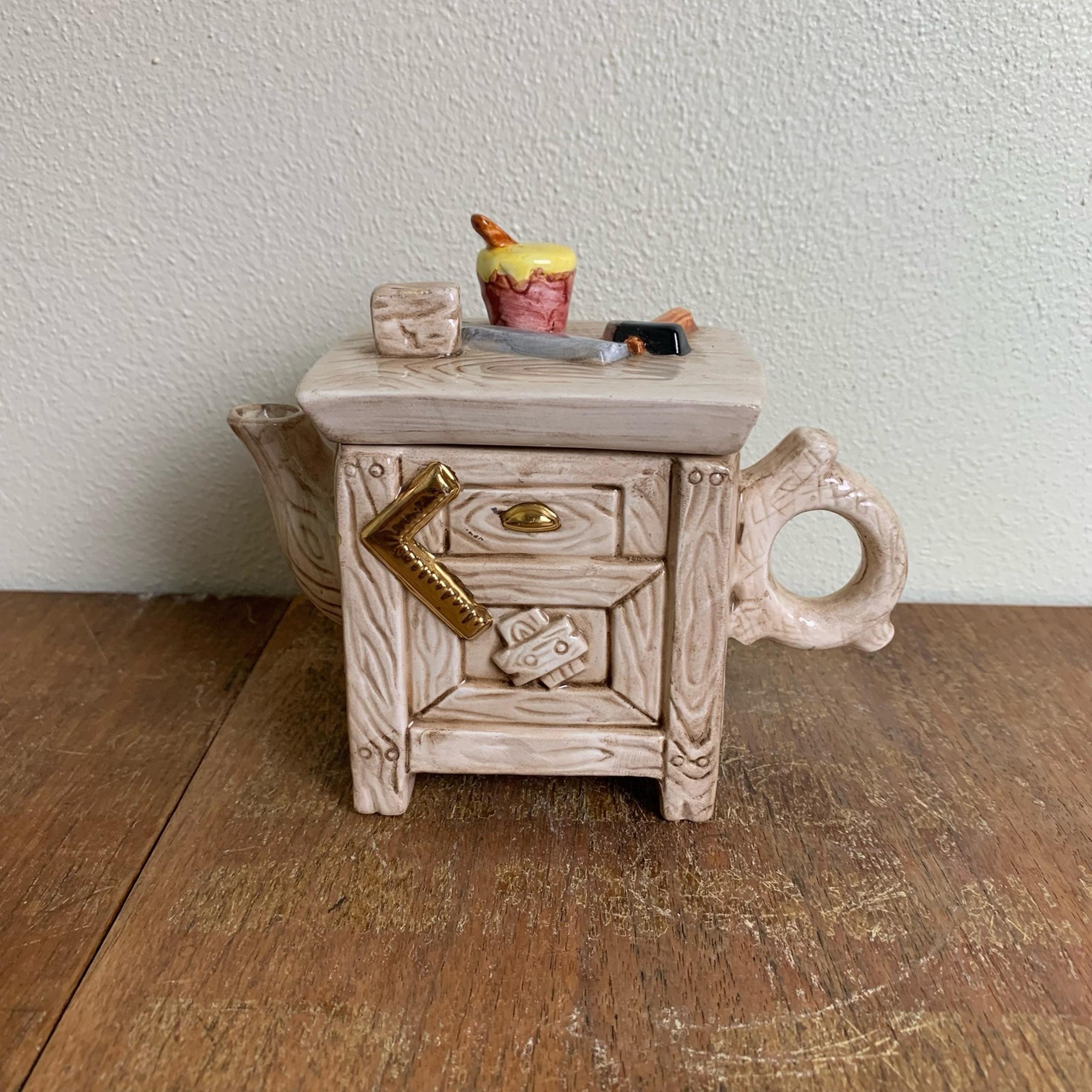 Vintage woodworking carpentry work bench decorative ceramic teapot