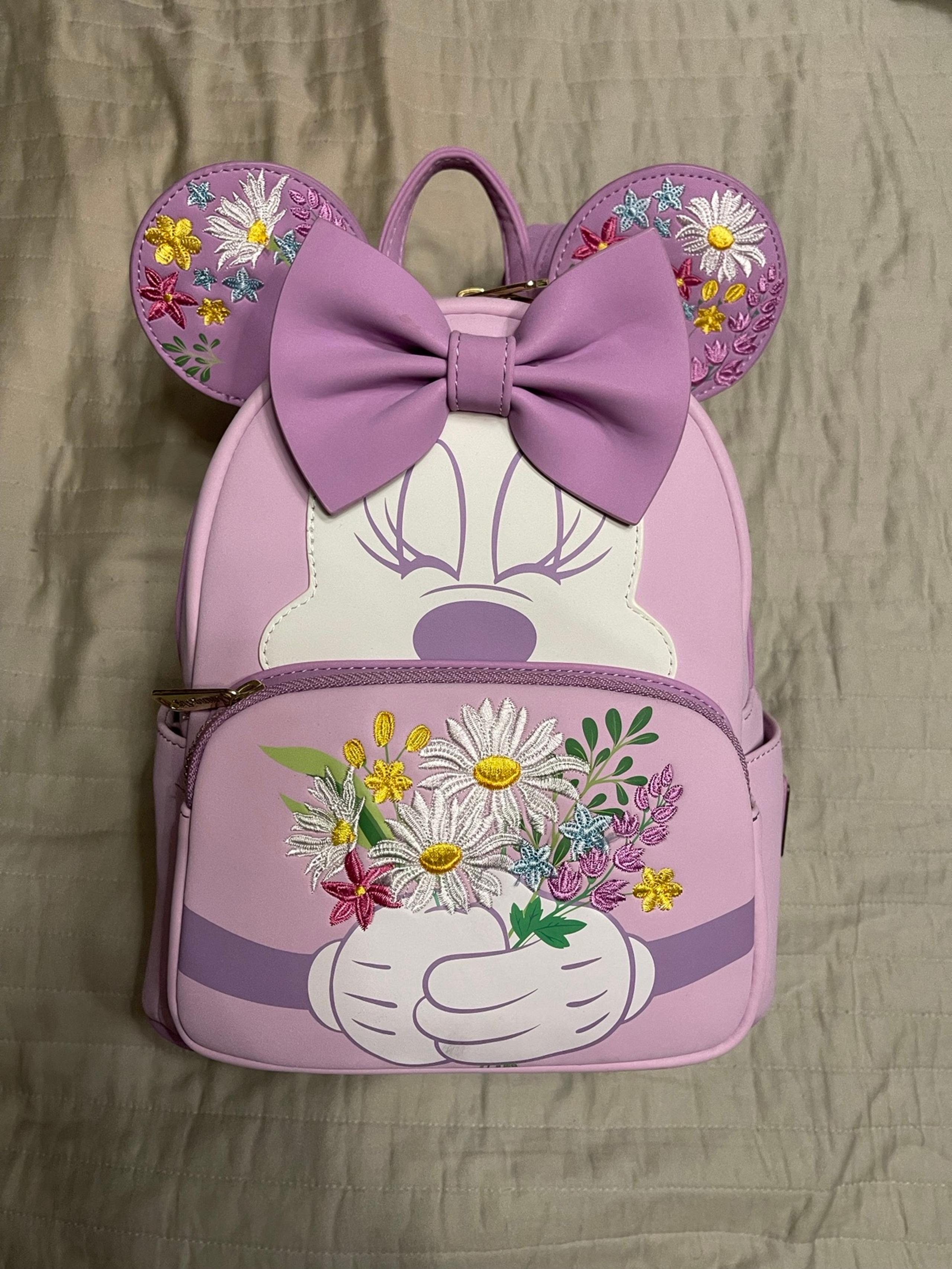 Minnie holding flowers loungefly