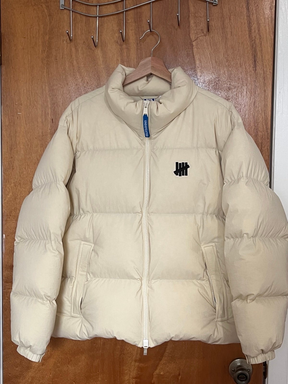 Undefeated icon down jacket
