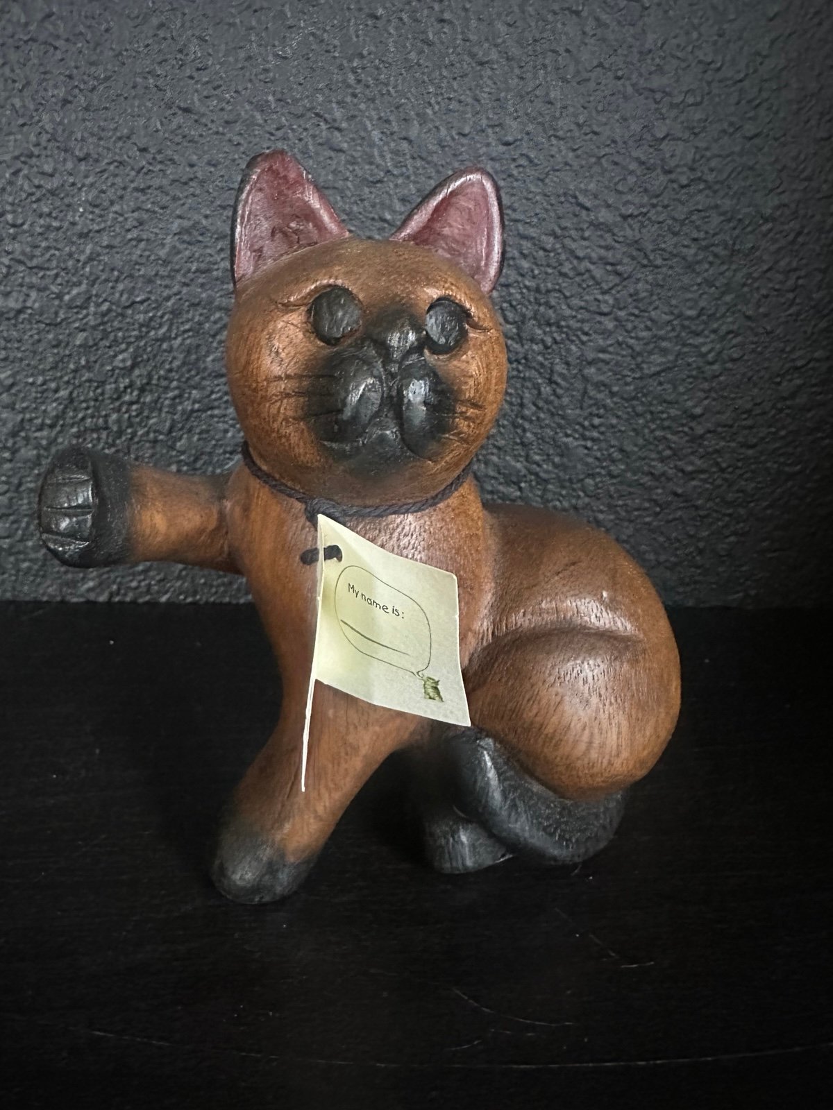 Carved wood cat by the Mandelay Box Company with tag Adopt me
