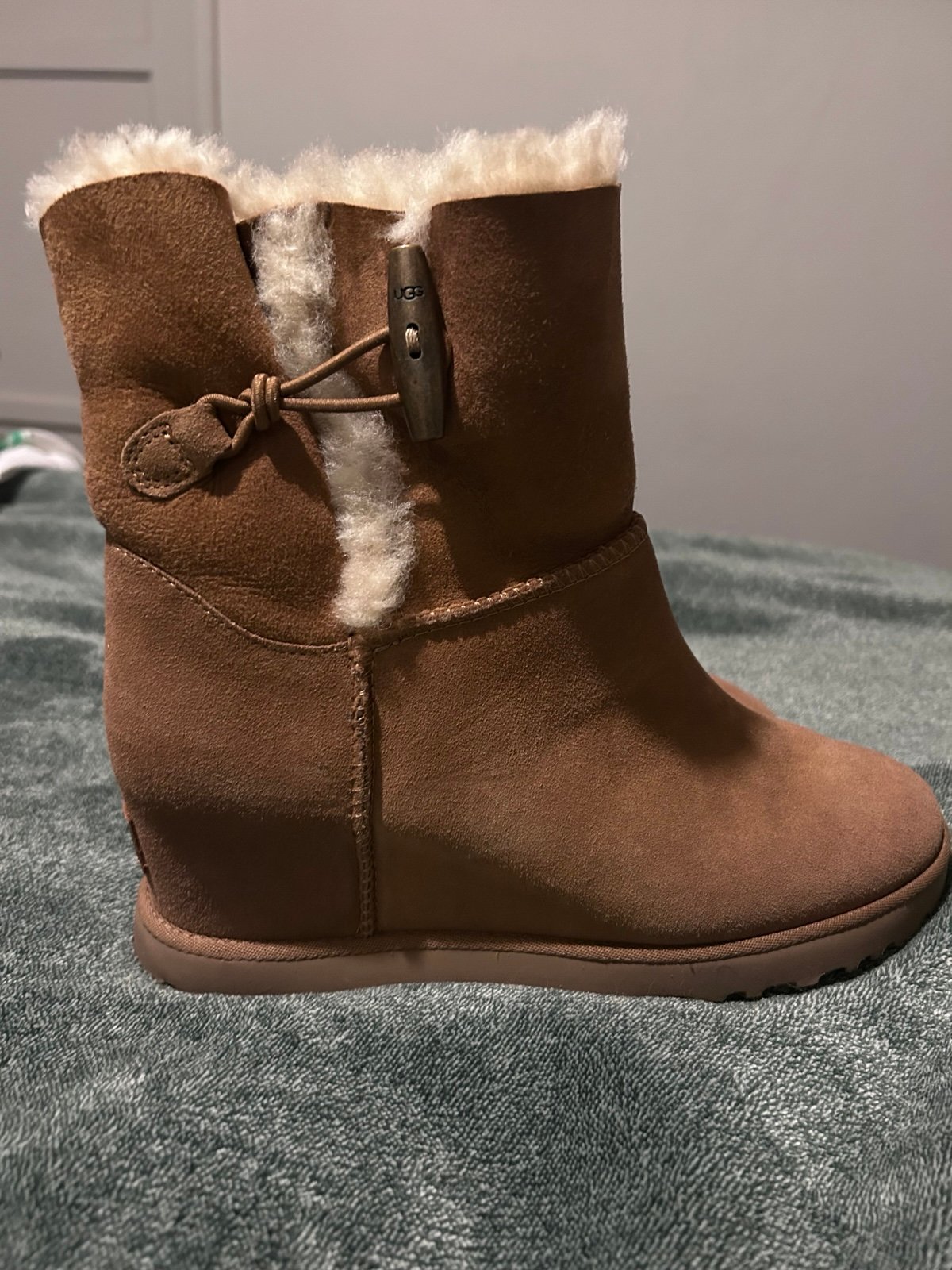 Women’s tan wedge Ugg boots