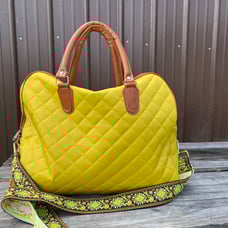Quilted yellow travel bag