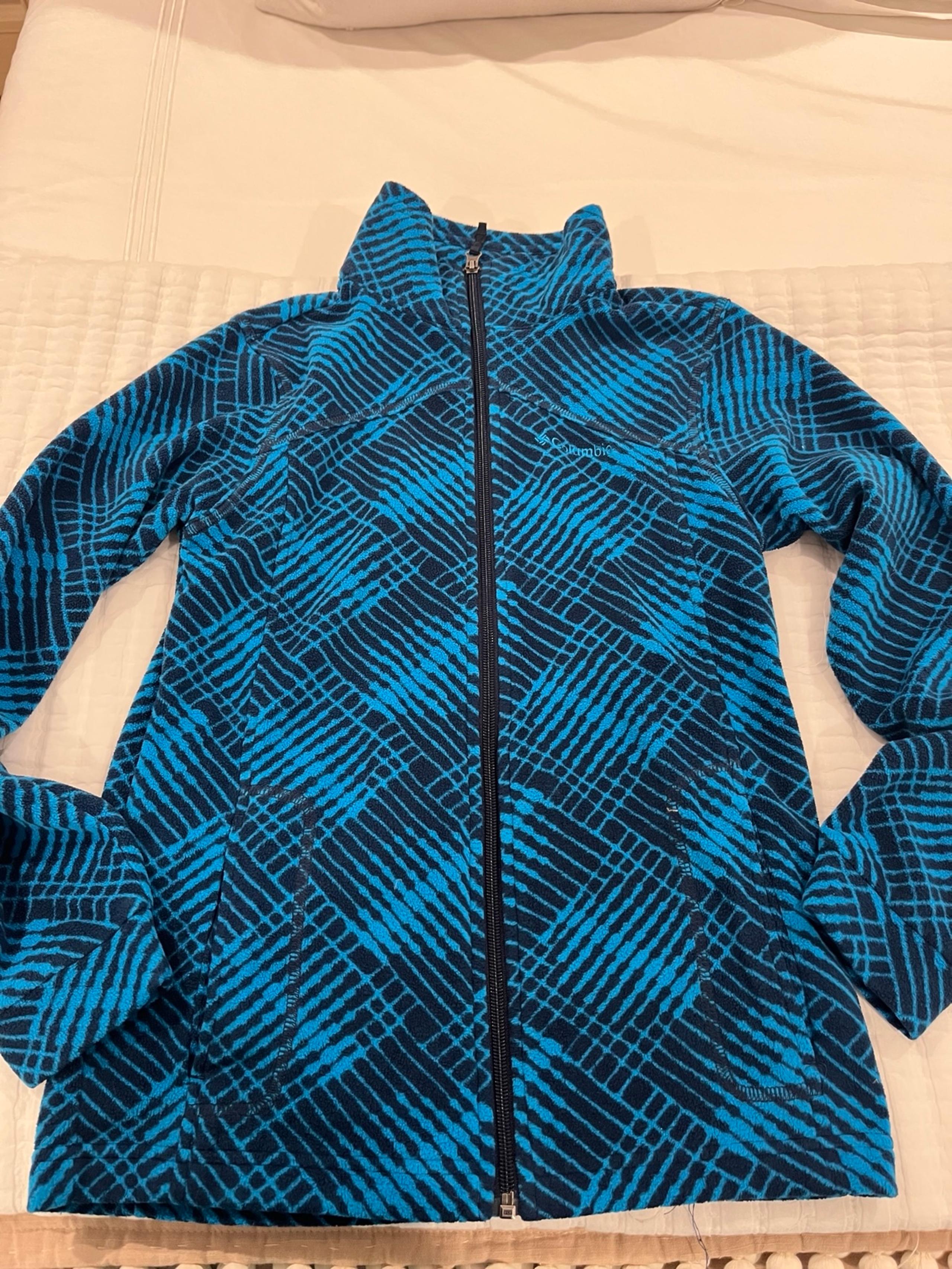 Colombia blue and black fitted fleece zip up. Kids size medium.