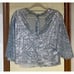 Set of two silver sparkling shirts one is Zara