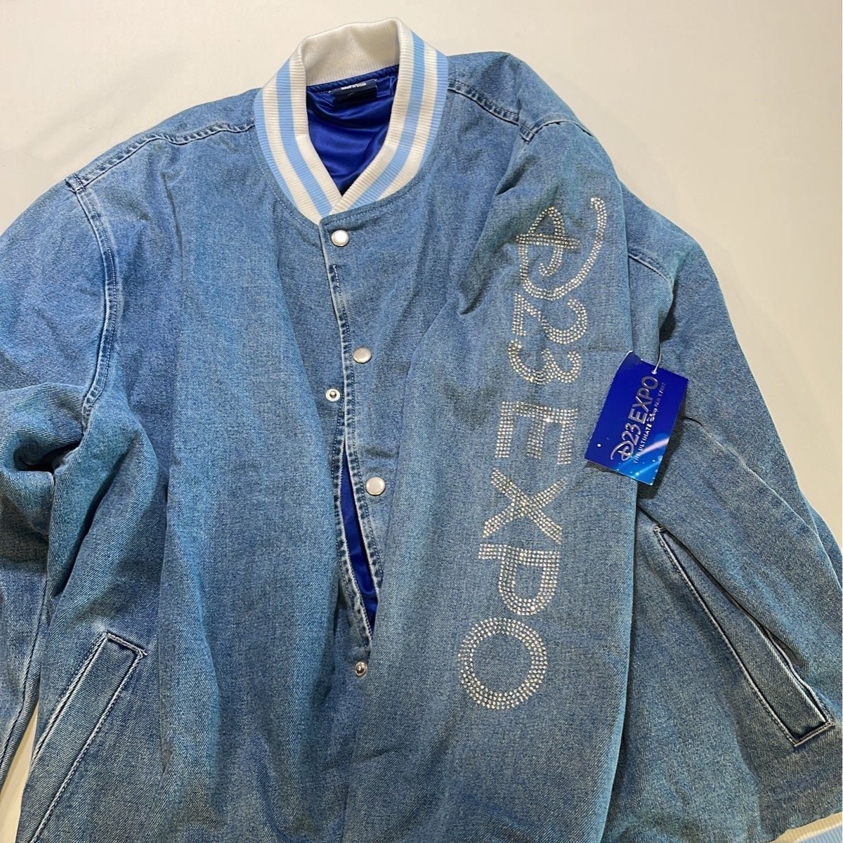 New D23 EXPO 2022 DENIM VARSITY JACKET