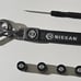 Nissan Bundle (Stainless Steel Tag, Keychain, and Tire Stem Covers)