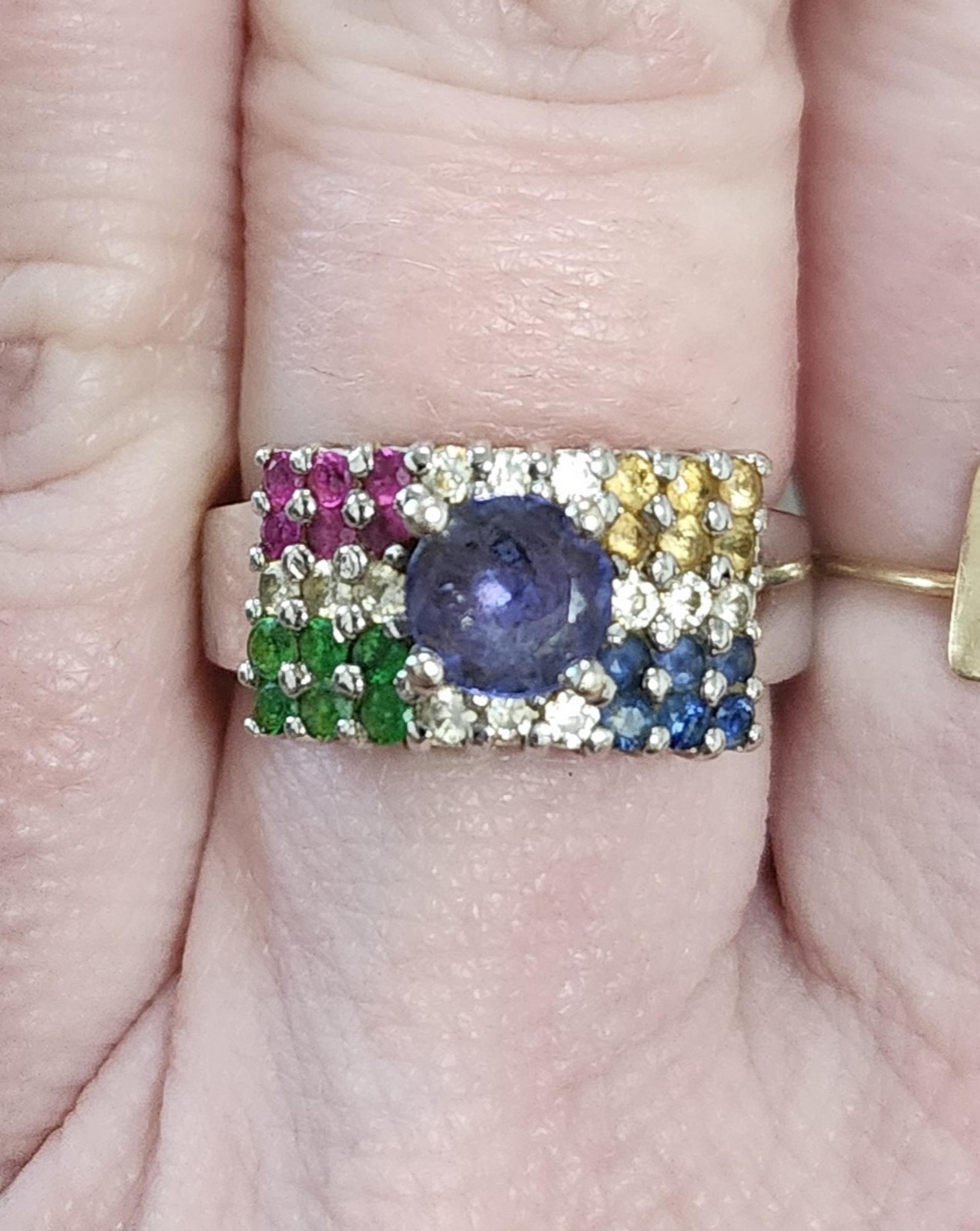 Levian 14k white gold ring with many gems and diamonds.
