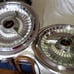 2-1963 Oldsmobile spinner hubcaps