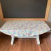 Floral print table cloth, napkins, napkin rings, 2 solid teal placemats