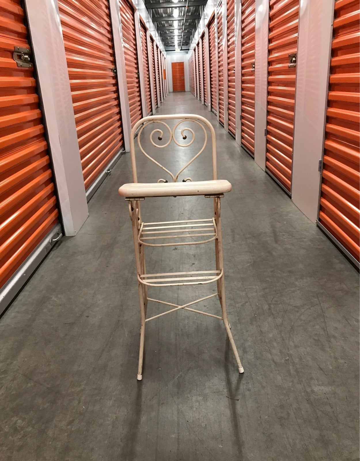 Antique heavy steel frame baby chair