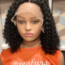 Handmade lace frontal curly human hair wig. Shoulder length.