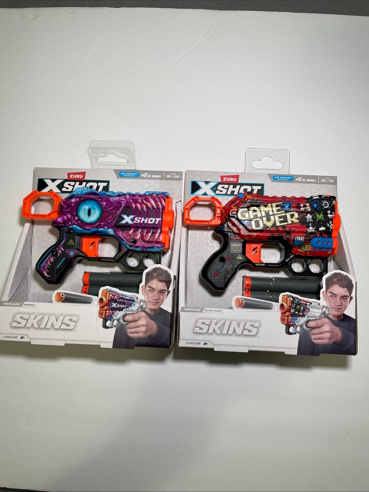 Lot of 2 Zuru X-Shot Skins Air Pocket Menace Enigma & Game Over