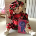 Apple dumpling porcelain doll