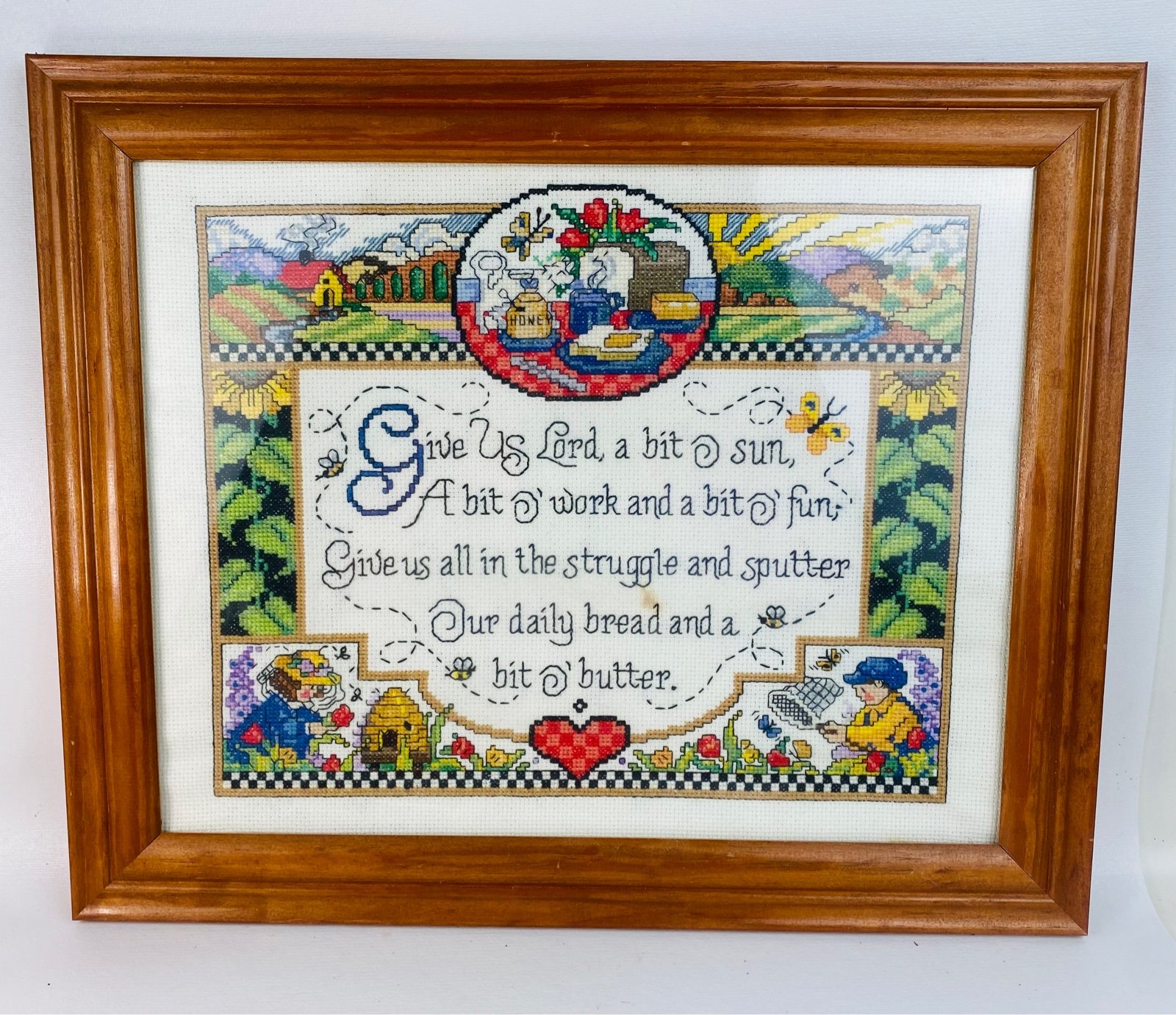1970s Wood Framed Picture Finished Counted Cross Stitch ‘Give us Lord a bit…’