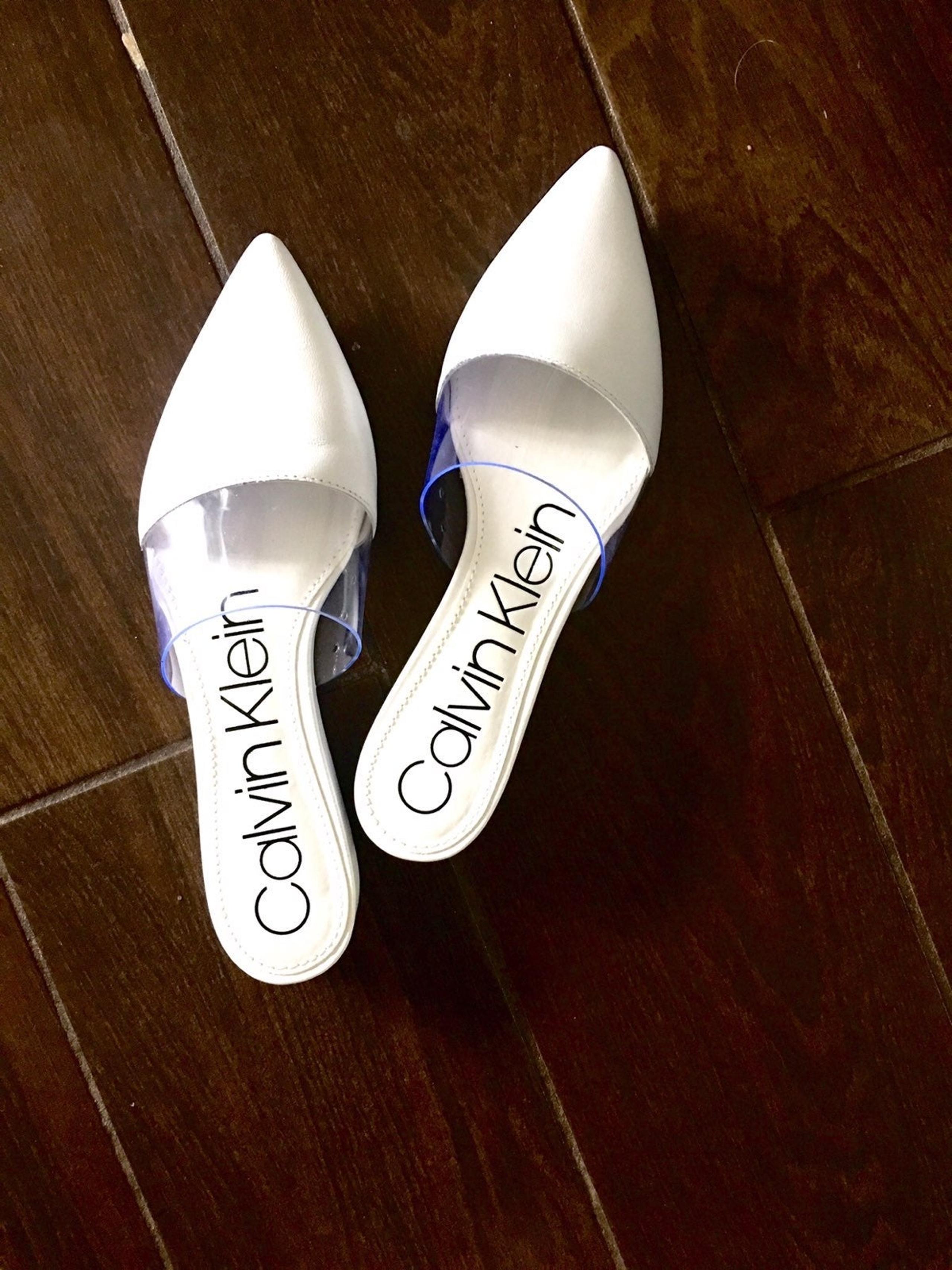 new white calvin klein slides, size 5.5